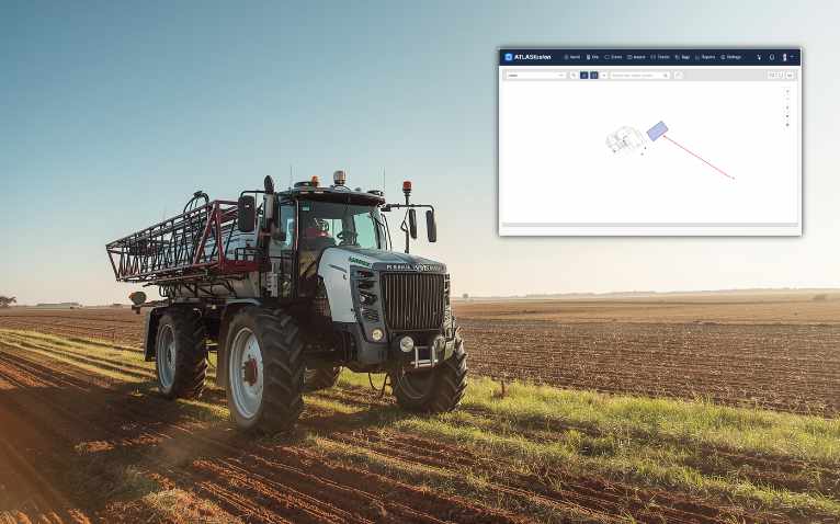A self-propelled crop sprayer parked at the edge of a broadacre paddock at dusk, with storm clouds gathering on the horizon.